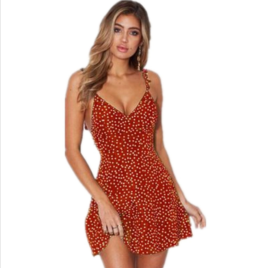 Vestido de verano con tirantes y estampado de lunares – Moda fresca y femenina