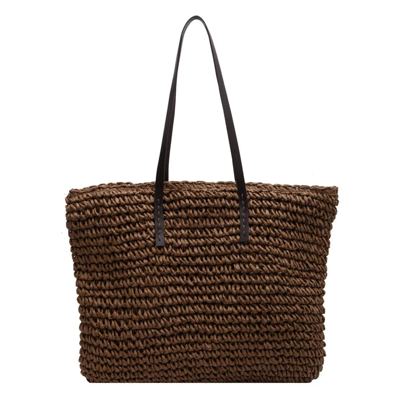 Bolso de paja con asas de cuero